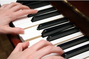Two-hands-piano.jpg